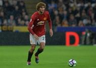 HULL, ENGLAND - AUGUST 27: Marouane Fellaini of Manchester United challenges  during the Premier League match between Manchester United FC and Hull City FC at KC Stadium on August 27, 2016 in Hull, England. (Photo by Mark Runnacles/Getty Images)